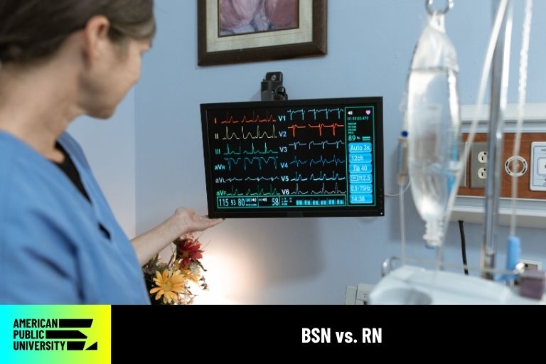 registered nurse looking at patient's vitals
