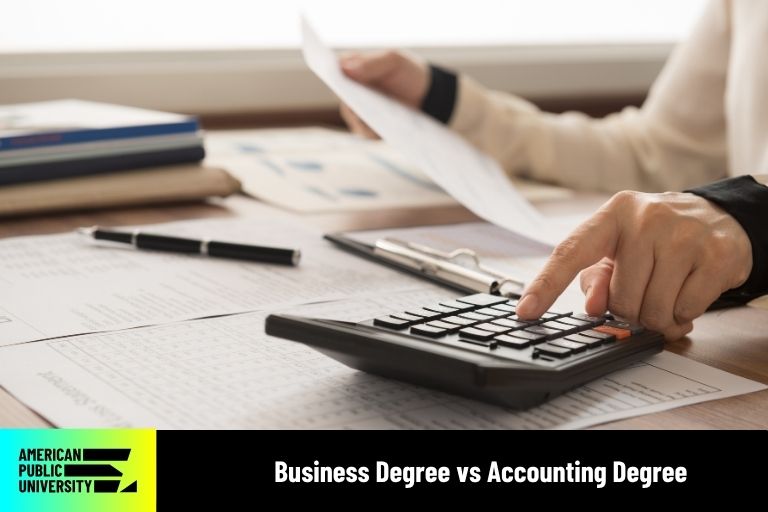business-vs-accounting accountant working on calculator