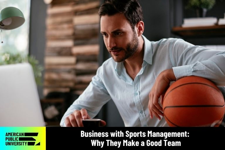 business with sports management professional holding basketball