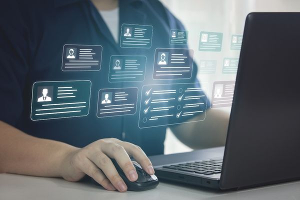 health information manager on laptop