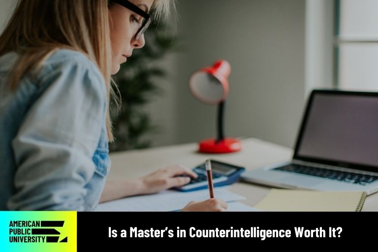 is-a-masters-in-counterintelligence-worth-it master's in counterintelligence student studying