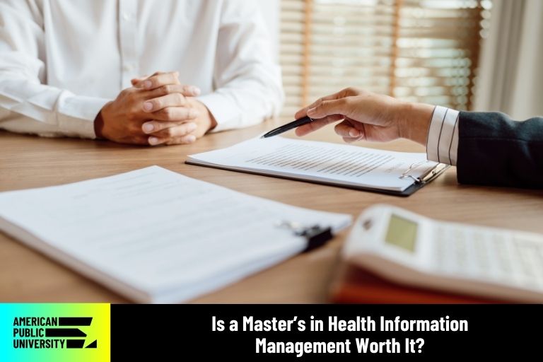 masters in health management student speaking with professor