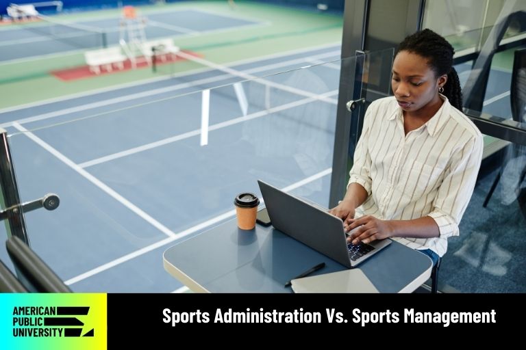 sports administrator on laptop