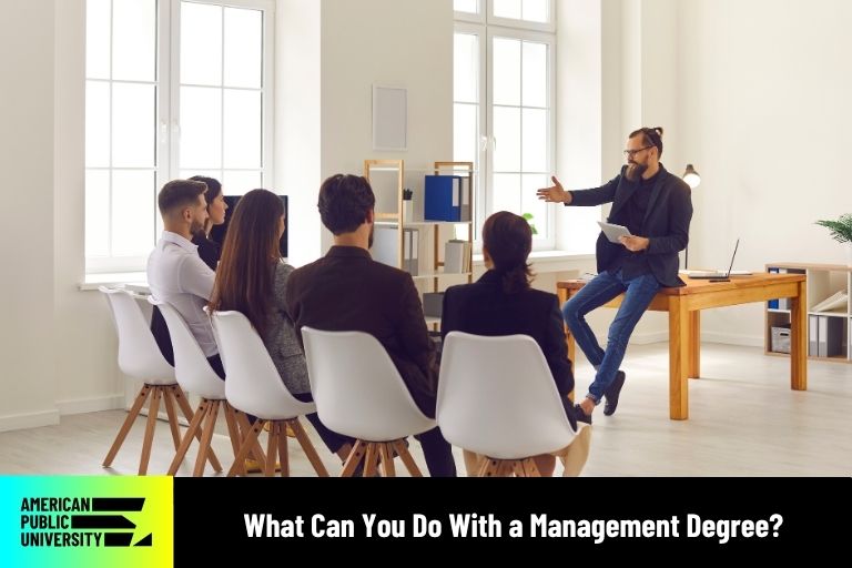 what-can-you-do-with-a-management-degree Management degree professionals collaborating