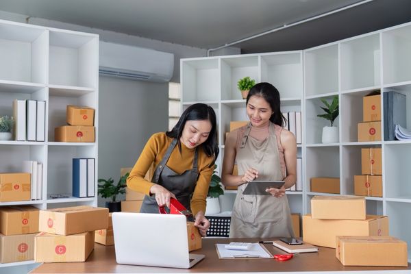 entrepreneurship degree students packing orders