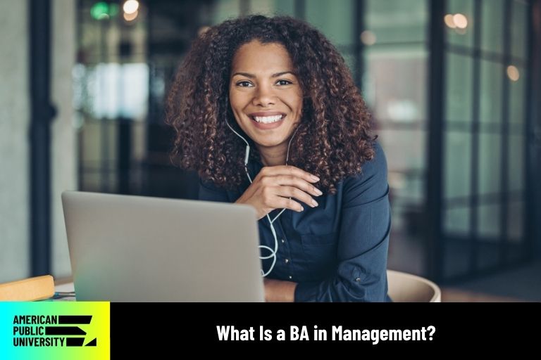 what-is-a-ba-management BA in Management student working on laptop