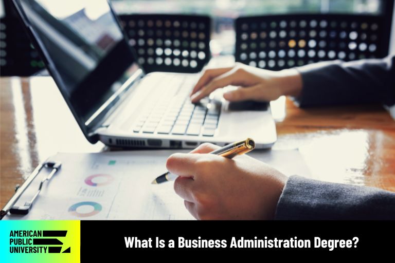 business administration degree student on laptop