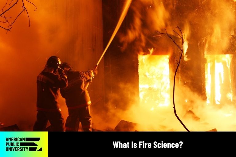 fire science graduates fighting house fire