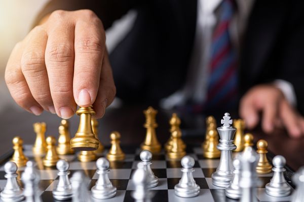 strategic intelligence student playing chess