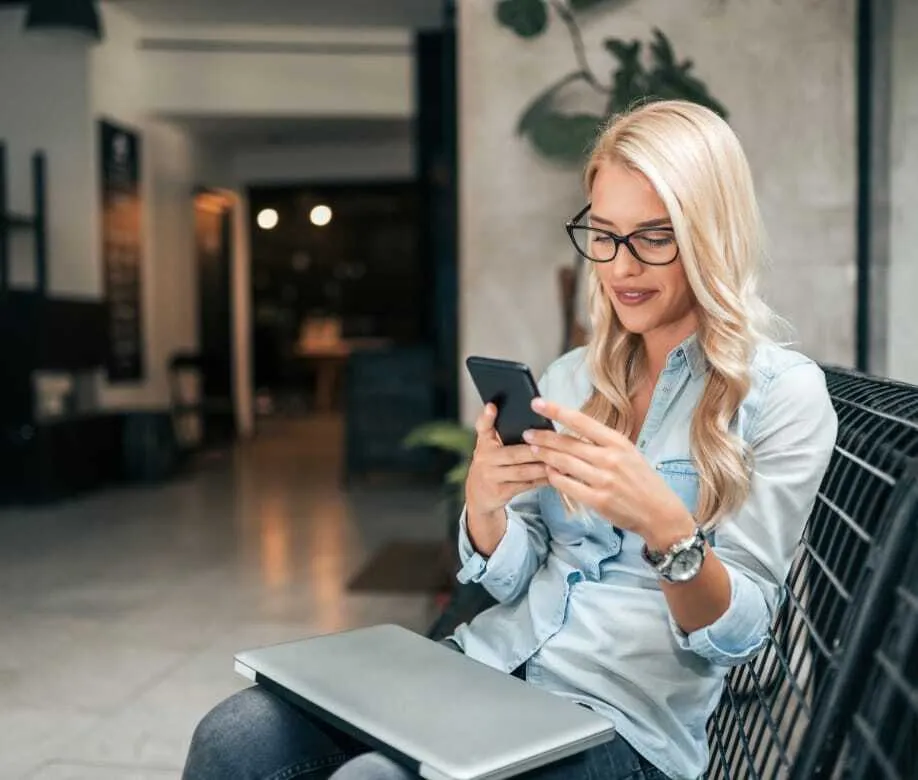 woman looking at phone